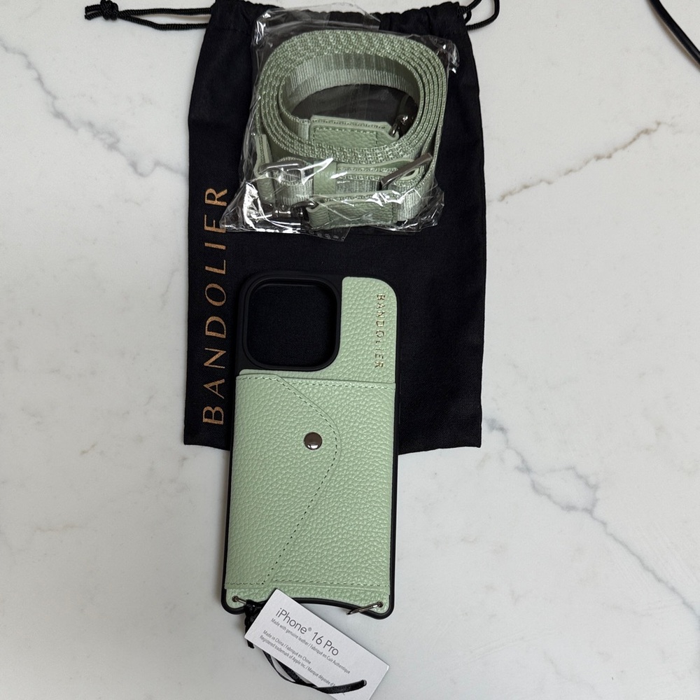 NEW Bandolier Bobby
Crossbody iPhone 16 Pro Case in Pastel Matcha/Silver